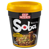 A black cup labeled "Nissin - Cup Noodles Soba Wok Style Classic - 90g" with a yellow lid, features Japanese soba noodles and vegetables. From the iconic Cup Noodles lineup, it's ready in 3 minutes.